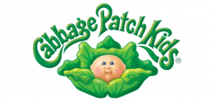 A Child's head in the center of a cabbage is the logo for the children's toy line 'Cabbage Patch Kids."